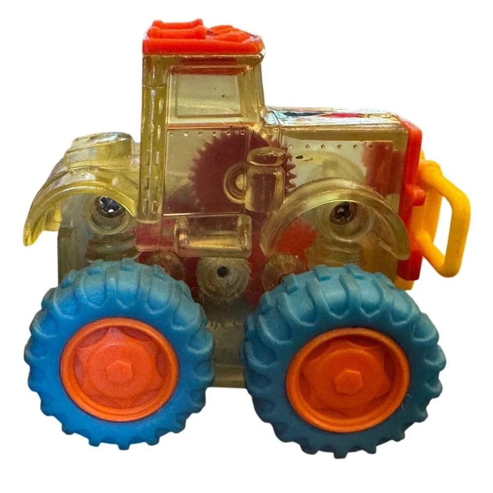 Vintage Go With God Clear Friction Monster Tractor Toy Blue Tires Visible Gears
